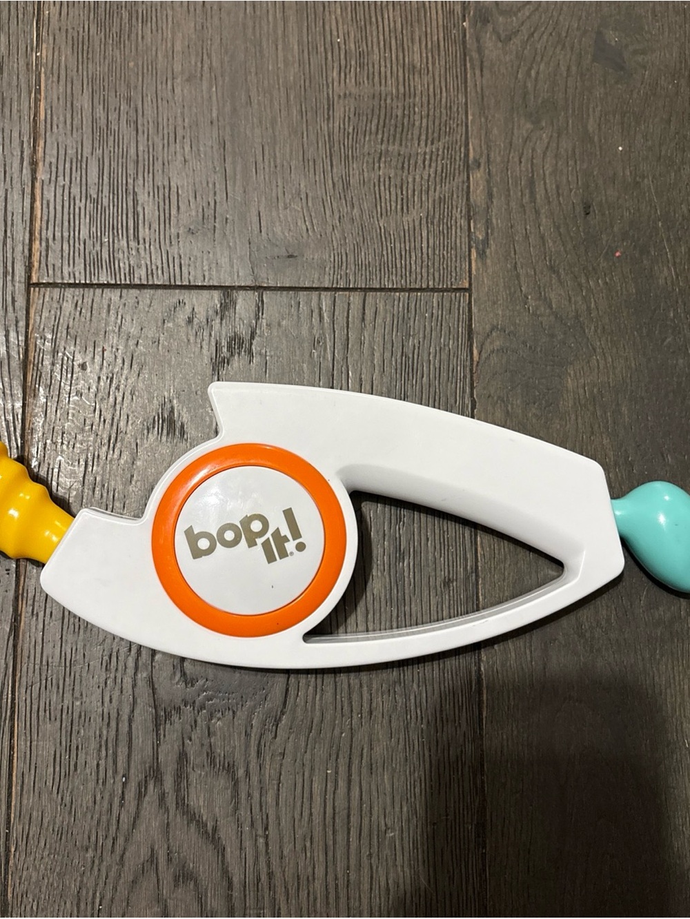 Hasbro Bop It! Handheld Game Toy in White, Orange, Yellow, Teal